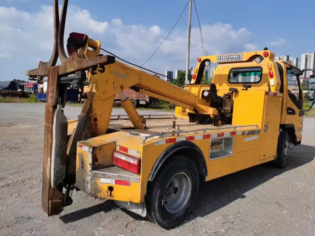 Rear left 45-degree view of a used tow truck